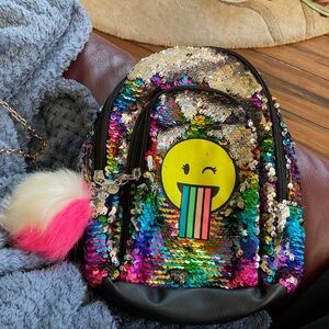 Emoji mini backpack, reversible sequins, rainbow reverses to silver with Pom Pom